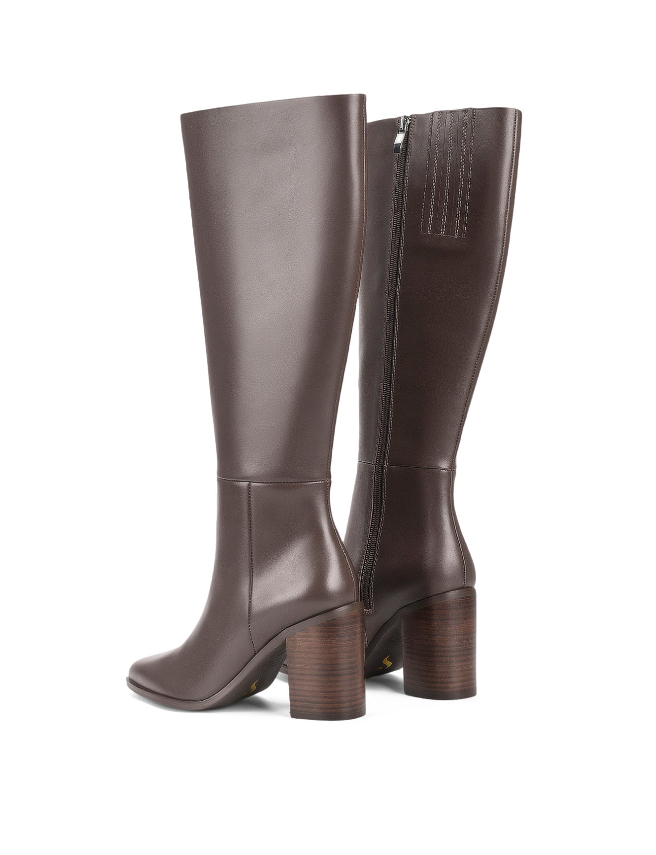 Women's leather knee high boots with stacked leather block high heel and pointed toe and inner zipper.
