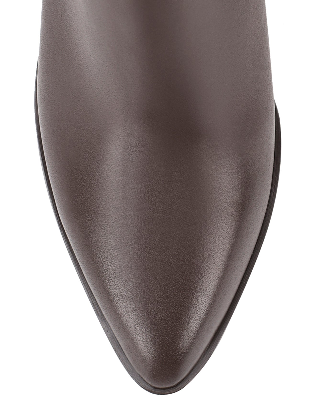 Women's leather knee high boots with stacked leather block high heel and pointed toe and inner zipper.