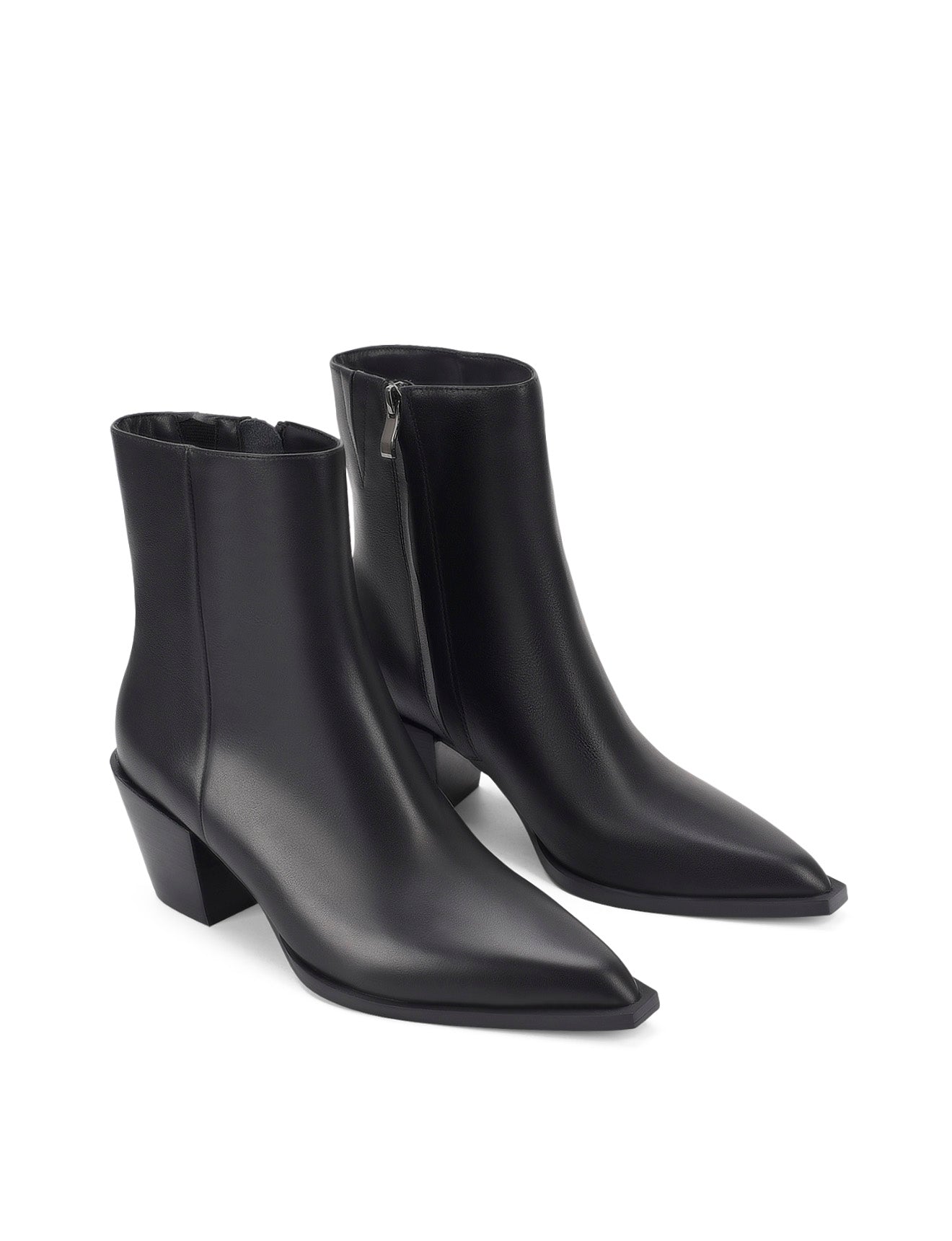 Women's premium leather ankle boot in black, inspired by cowboy western boots, with structural block heel and pointed toe