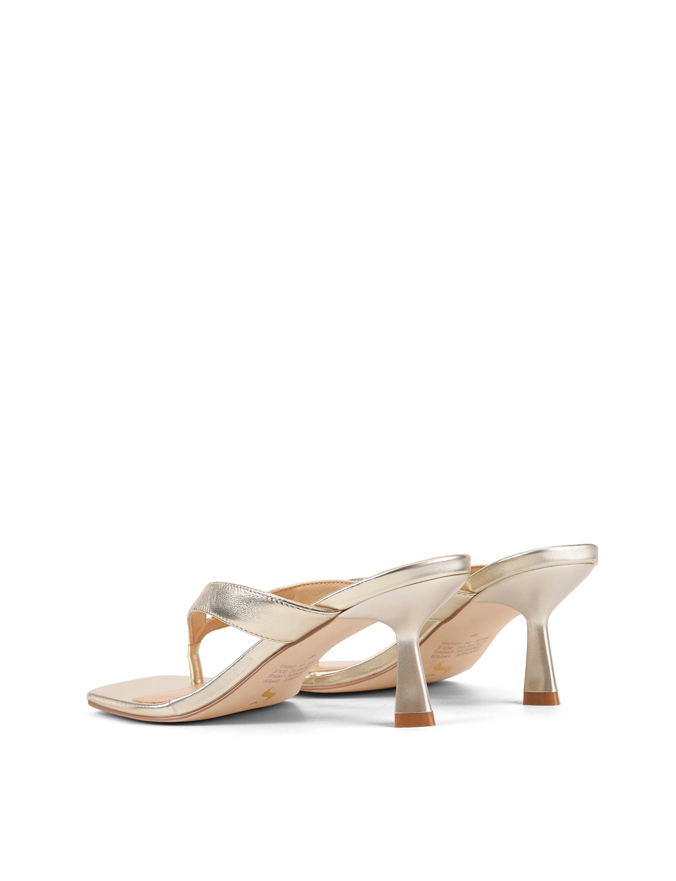 Women's thong heeled sandal mule with square toe in metallic gold leather