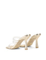 Women's gold metallic strappy mule with stiletto heel and clear vinylite upper