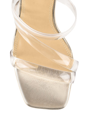 Women's gold metallic strappy mule with stiletto heel and clear vinylite upper