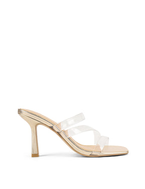 Women's gold metallic strappy mule with stiletto heel and clear vinylite upper