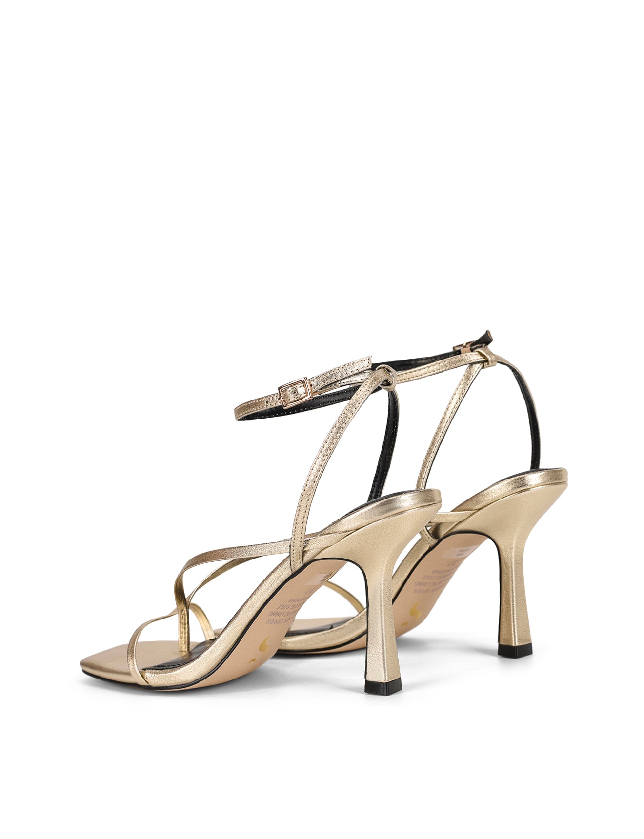 Women's gold leather strappy thong heels with stiletto heel