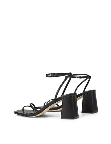 Women's black leather block heel strappy sandal with buckle fastening