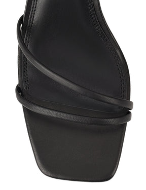 Women's black leather block heel strappy sandal with buckle fastening