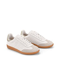 Women's white leather lace up sneaker with gold detail and contrasting sole