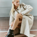 Women's block heel ankle boot with stacked leather heel and almond toe shape in black leather