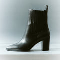Women's black leather chelsea boot with elastic gusset, stacked block heel and soft square toe