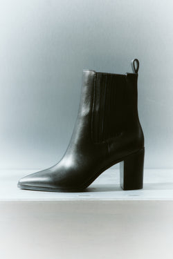 Women's black leather chelsea boot with elastic gusset, stacked block heel and soft square toe