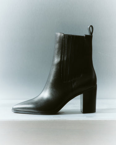 Women's black leather chelsea boot with elastic gusset, stacked block heel and soft square toe