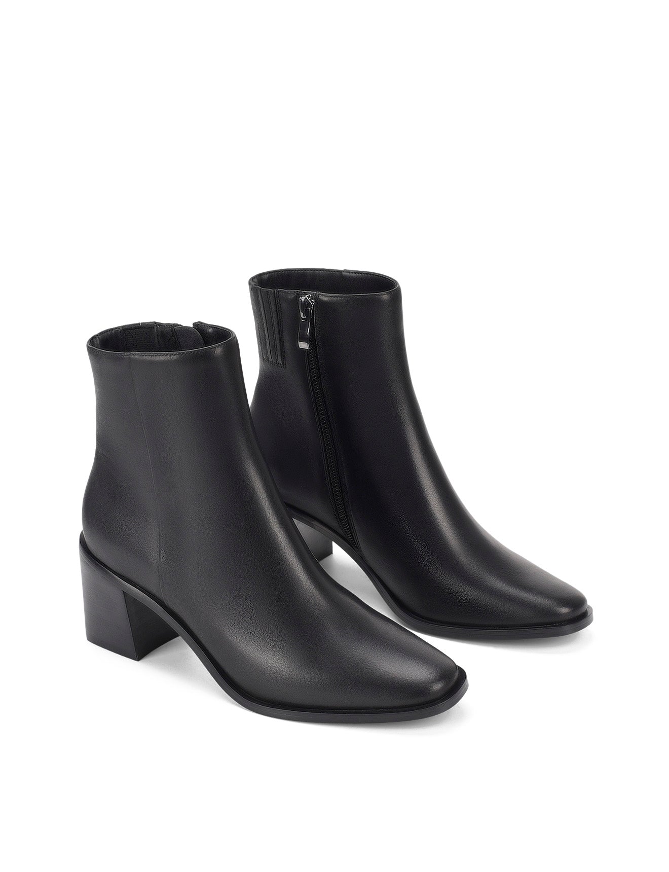 Women's block heel ankle boot with stacked leather heel and almond toe shape in black leather