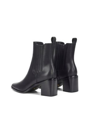 Women's black leather chelsea boot with elastic gusset, stacked block heel and soft square toe