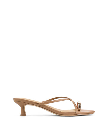 Women's kitten heel strappy sandal with gold metallic toe ring in tan leather