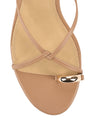 Women's kitten heel strappy sandal with gold metallic toe ring in tan leather