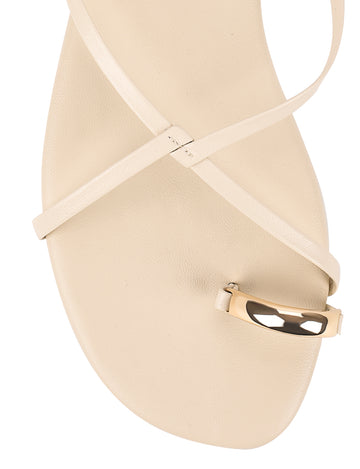 Women's kitten heel strappy sandal with gold metallic toe ring in chalk white leather