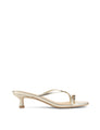Women's kitten heel strappy sandal with gold metallic toe ring in gold metallic leather