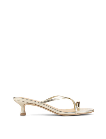 Women's kitten heel strappy sandal with gold metallic toe ring in gold metallic leather