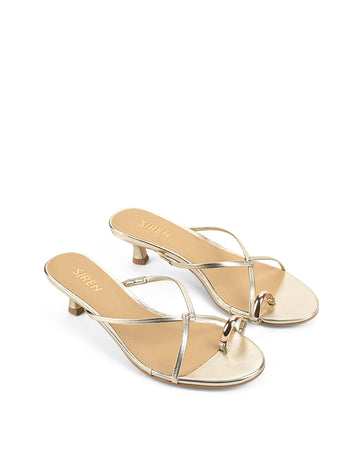 Women's kitten heel strappy sandal with gold metallic toe ring in gold metallic leather