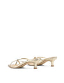 Women's kitten heel strappy sandal with gold metallic toe ring in gold metallic leather