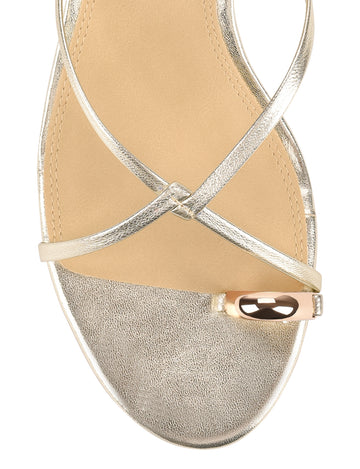Women's kitten heel strappy sandal with gold metallic toe ring in gold metallic leather