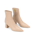 Women's nude stretch leather heeled ankle boot with pointed toe and zip closure