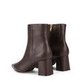 Women's chocolate brown leather ankle boot with high heel and pointed toe