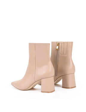 Women's nude leather ankle boot with zip closure, pointed toe and block heel