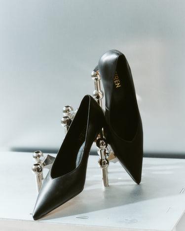 Women's black leather stiletto pumps with pointed toe and v cut throat