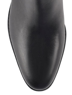 Women's black leather riding boot with block heel and round toe
